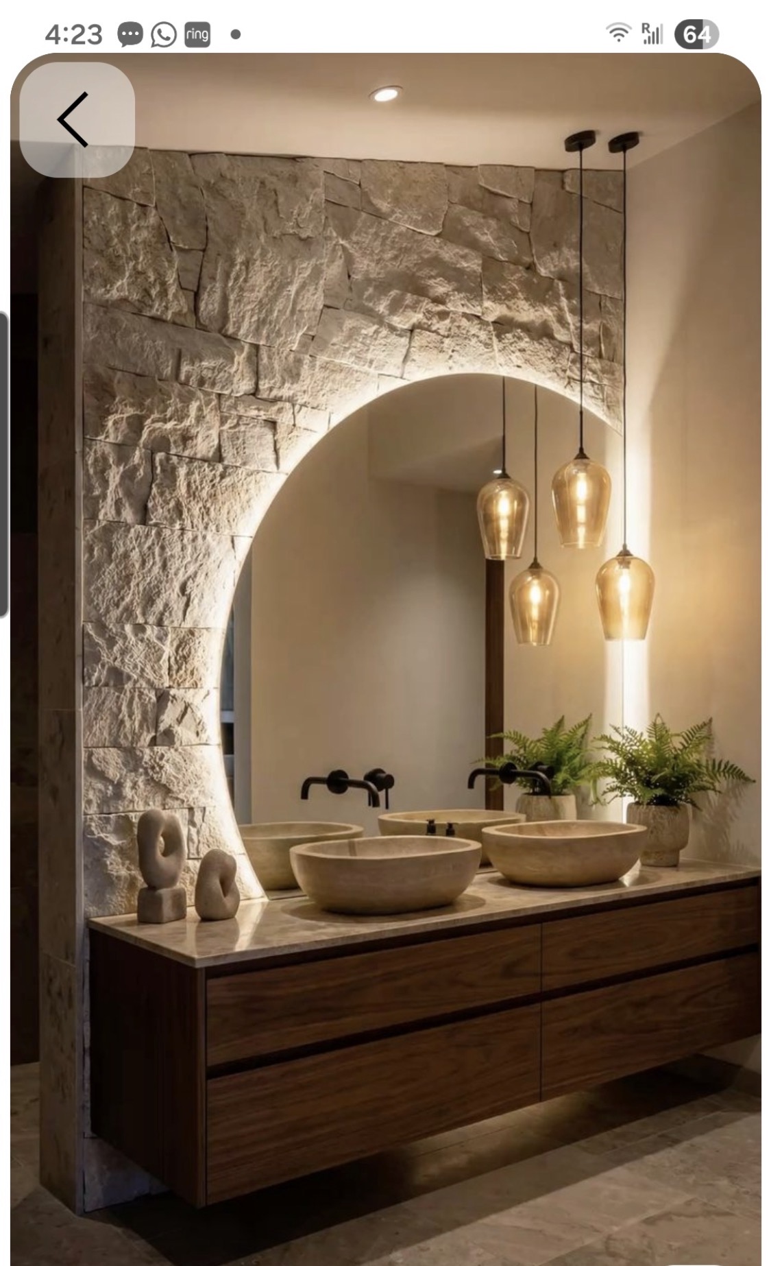 Stone arch and warm lighting vanity inspiration
