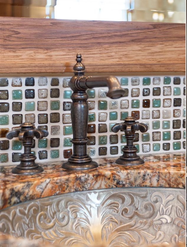 Artisan faucet and mosaic backsplash detail