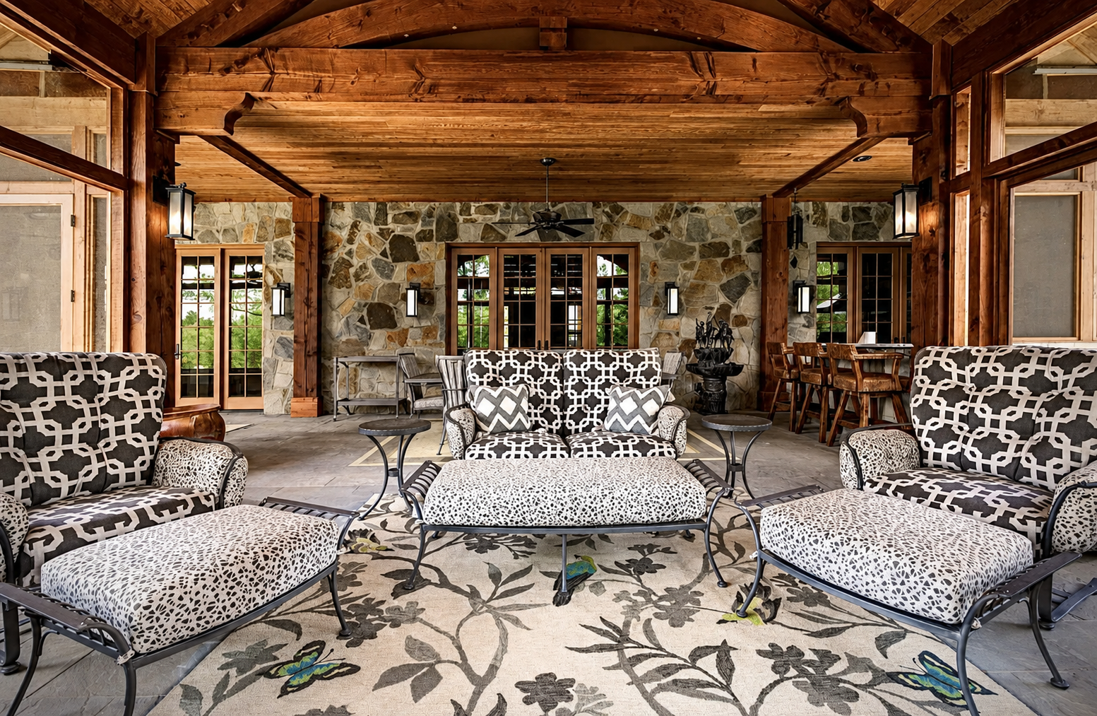 Covered patio with patterned sofa and lounge chairs